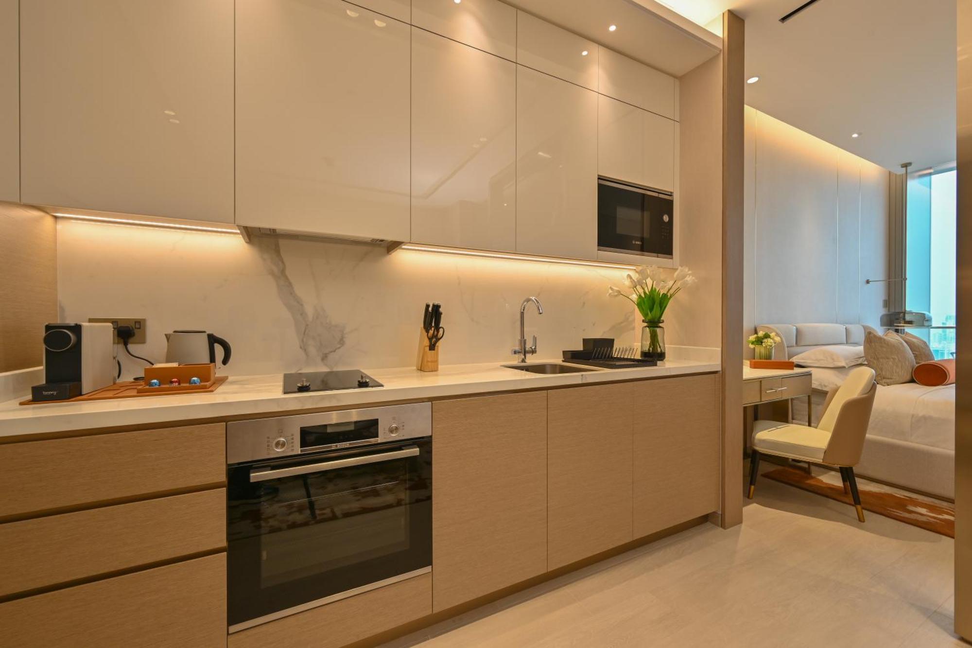 Hotel Onyx Rotana Manama Exterior foto A kitchen in a serviced apartment in Hong Kong